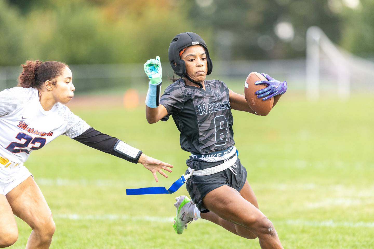 Willowbrook's Janell Adams runs past West Aurora's Sonia Alanis at the Sectional Final on Tuesday, Oct. 14,2025 in South Elgin.