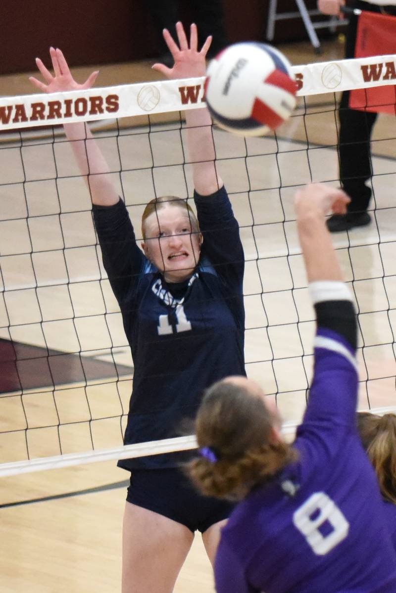 Cissna Park's Sophie Duis (11) looks to block a hit from Lexington's Avery Poppe during the IHSA Class 1A Watseka Sectional championship Thursday, Nov. 6, 2025.