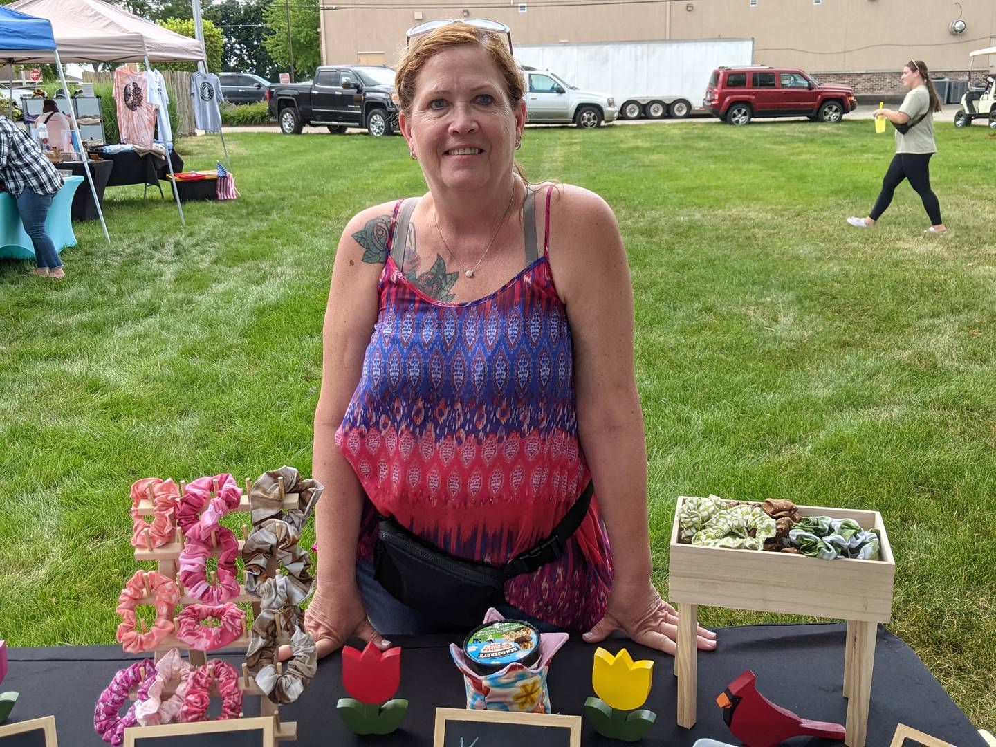 Robyn Boyd, owner of The Crafty Byrd Designs, showed off some of the products she makes. She along with other vendors were set up next to the Sandwich Fire Protection District’s eighth annual “Blaze in the City” car and bike show held on July 6.