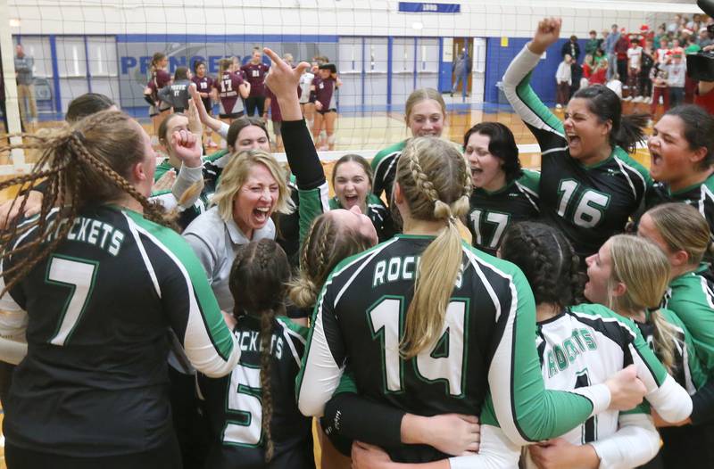 Members of the Rock Falls volleyball team pose with super fans defeating Illinois Valley Central in the Class 2A Sectional final game on Wednesday, Nov. 1, 2023 at Princeton High School.