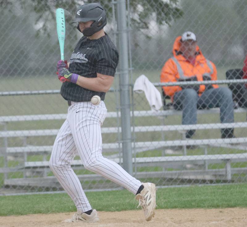Woodland's Brayden Matsko gets hit by the pitch on Tuesday, May 12, 2026 at Woodland High School.