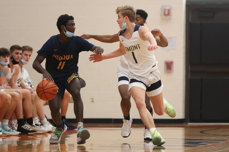 Neuqua Valley’s Jayden Deanfights off the pressure from Lemont’s Matas Castillo in the Warrior Showdown shootout at Lincoln-Way West. Saturday, Jan. 29, 2022 in New Lenox.