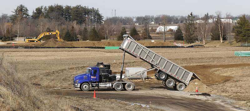 Construction continues on the installing water and sewer lines in the Stonewater subdivision in Wonder Lake on Friday, Feb. 24, 2023. When the subdivision is finished, 3,400 to 3,700 more rooftops will be added to Wonder Lake, potentially making the village one of the larger municipalities in McHenry County.