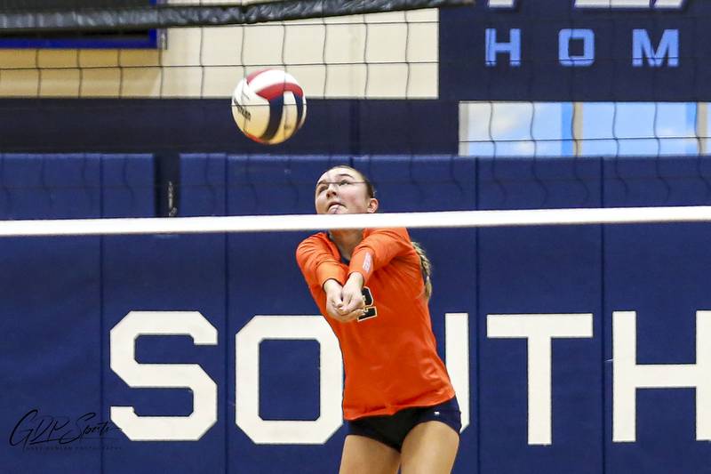 Oswego's Avery Borowski (2) with a dig save during Class 4A Regional Final volleyball match between Neuqua Valley at Oswego. Oct 30, 2025 in Plainfield.