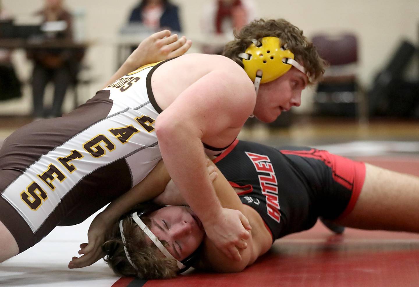 Jacobs’ Lucas Retzler tries to pin Huntley’s Max Dziamidau during the 1xx—pound match of a Fox Valley Conference wrestling meet on Thursday, Dec. 11, 2025, at Huntley High School.