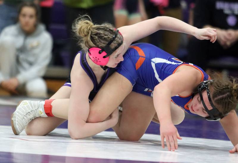Genoa-Kingston’s Violet Sanders, right, battles Hampshire’s Stella Piazza at 120 pounds in Whip-Pur Women’s Classic varsity girls wrestling on Saturday, Dec. 20, 2025, at Hampshire High School in Hampshire.