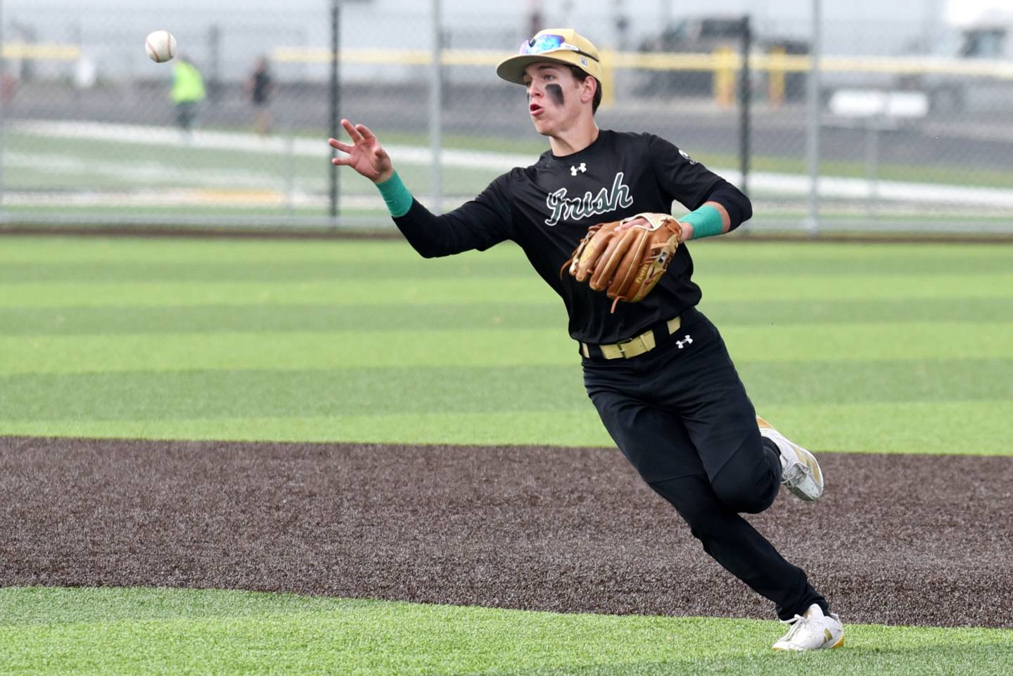 Bishop McNamara's Taylor Fuerst barehands a ground ball during the Class 2A Herscher Regional semifinals against Central Thursday, May 22, 2025.