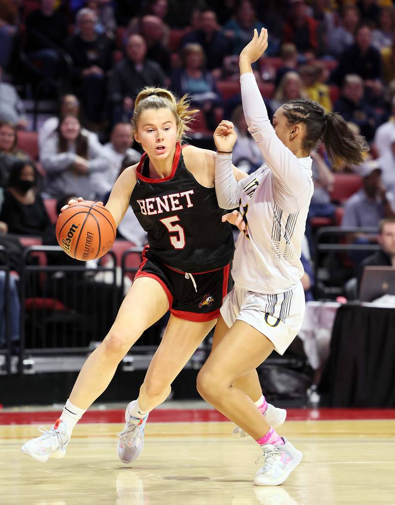 Benet Academy's Lenee Beaumont (5) drives to the hoop past a O’Fallon  defender during the IHSA Class 4A girls basketball championship game at the CEFCU Arena on the campus of Illinois State University Saturday March 4, 2023 in Normal.
