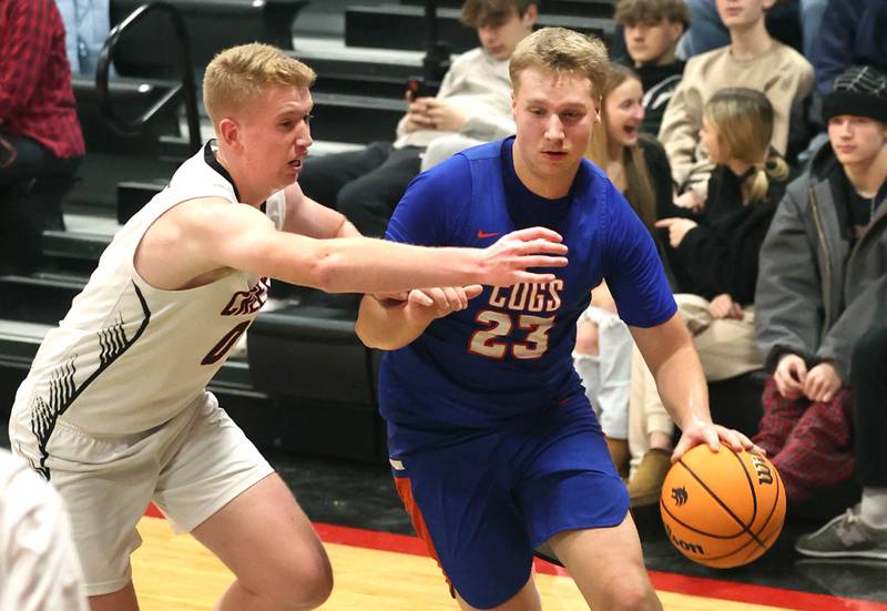 Genoa-Kingston's Hayden Hodgson goes baseline against Indian Creek's Everett Willis during their game Friday, Jan. 3, 2025, at Indian Creek High School in Shabbona.