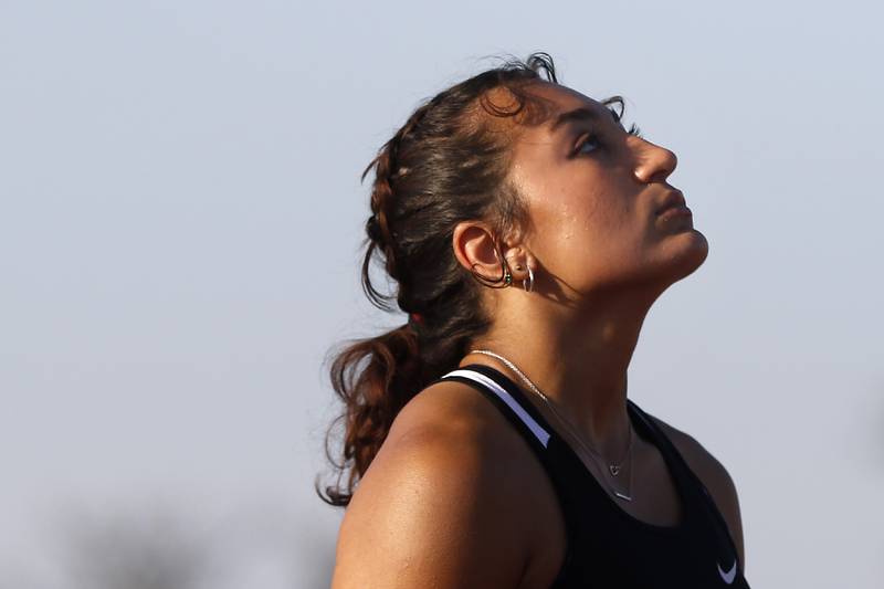 Huntley's Sophie Amin prepares to start the 4x100 meter relay Friday, May 10, 2023, during the IHSA Class 3A Huntley Girls Track and Field Sectional at Huntley High School.