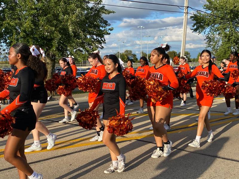 DeKalb Barbs cheerleaders spread some school spirit during the annual DeKalb High School Homecoming Parade on Wednesday, Sept. 24, 2025, along West Dresser Road.