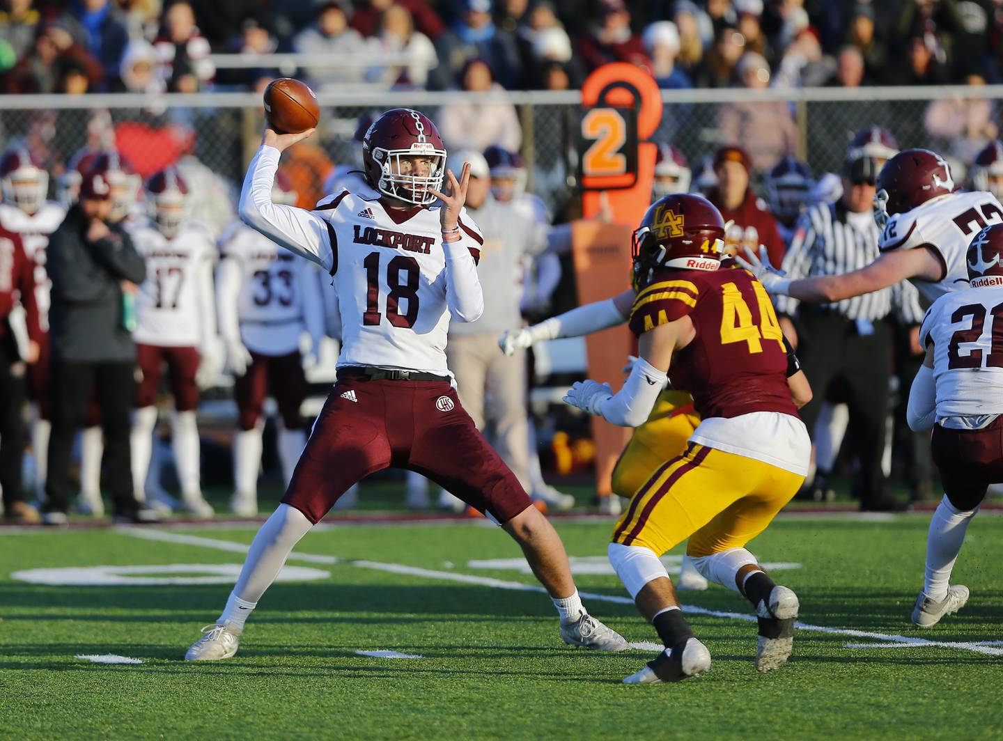 Lockport's Hayden Timosciek passes the ball during the IHSA Class 8A varsity football semifinal playoff game between Lockport Township and Loyola Academy on Saturday, November 20, 2021 in Wilmette.