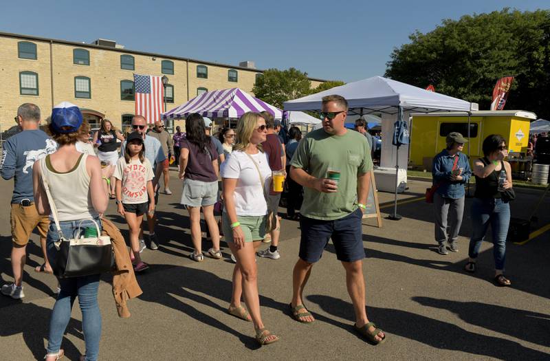 Visitors to the Batavia MainStreet’s Block Party & Taste of Batavia sample food and drink while enjoying musical entertainment on Sunday, Aug 31, 2025 in Batavia.