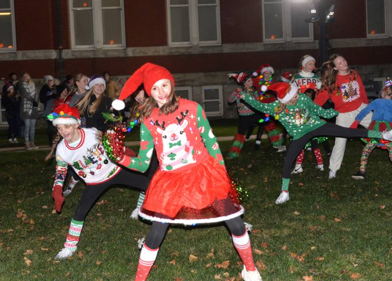 The Byron Dance Academy performed on the Ogle County Courthouse lawn during the tree lighting ceremony at Oregon's Candlelight Walk on Saturday, Nov. 25, 2023.. The evening event included Christmas music, shopping specials, kids activities, horsedrawn wagon rides and visits with Santa.