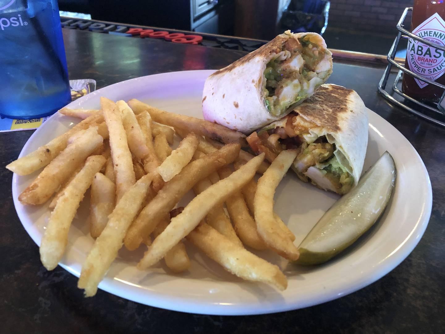 Hoops Bar and Grill in Hebron browns its wraps on the grill for added flavor and preventing a soggy tortilla.