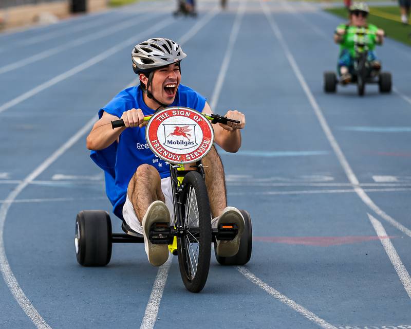 Exxon Mobile's Yaser Zaatini finishes first in his heat during the Great American Big Wheel Race.  July 22nd, 2023