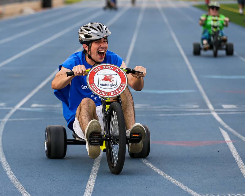 Exxon Mobile's Yaser Zaatini finishes first in his heat during the Great American Big Wheel Race.  July 22nd, 2023