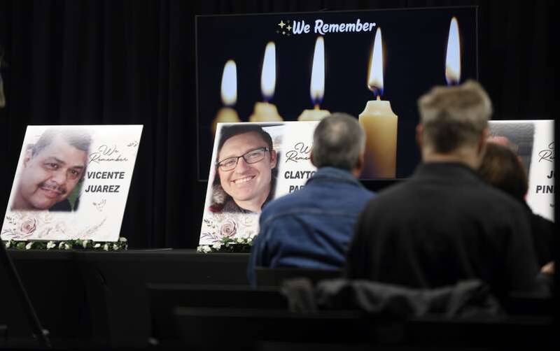 People gather at a ceremony Saturday six years after a workplace shooting at Henry Pratt Co. took the lives of Russell Beyer, Vincente Juarez, Clayton Parks, Josh Pinkard and Trevor Wehner.