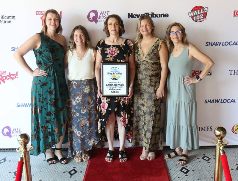 The staff with Kishauwau Cabins pose for a photo during the second annual Best of the Illinois Valley event on Thursday at the Auditorium Ballroom in La Salle.