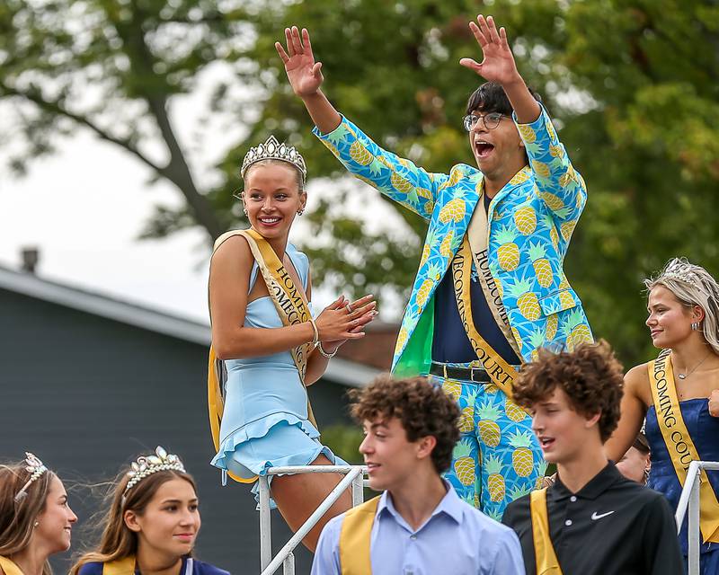 The Downers Grove South Homecoming Court ride in the Downers Grove South Homecoming Parade. Sept 28, 2024 in Downers Grove.