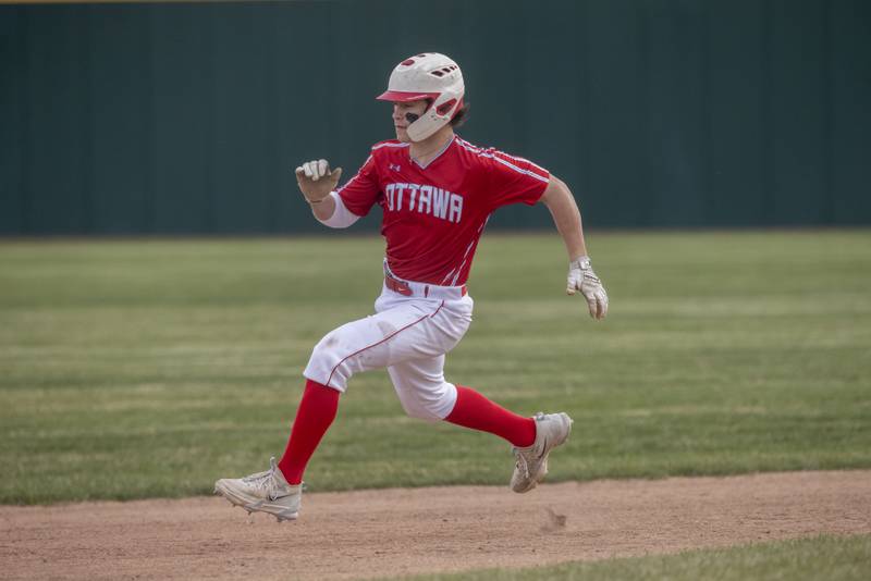 Ottawa's Jace Veith runs to third base against La Salle-Peru on Monday, April 22, 2024 in La Salle.