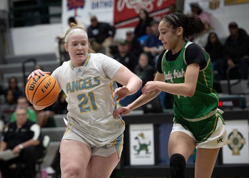 Joliet Catholic's Emma Birsa, left, controls the ball as Bishop McNamara's Jaide Burse, right guards during the Class 2A Regional Championship on Thursday, Feb. 19, 2026.