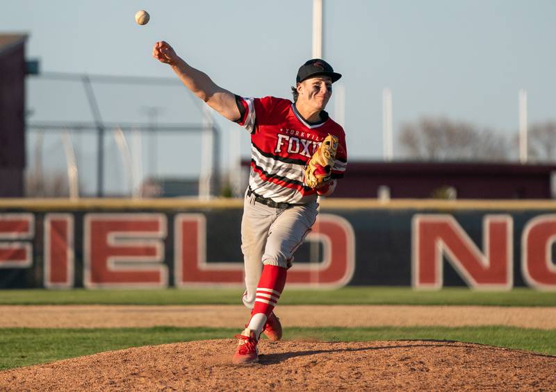 Yorkville's Owen Ross (14) delivers a pitch against Plainfield North during a baseball game at Plainfield North High School on Thursday, April 21, 2022.