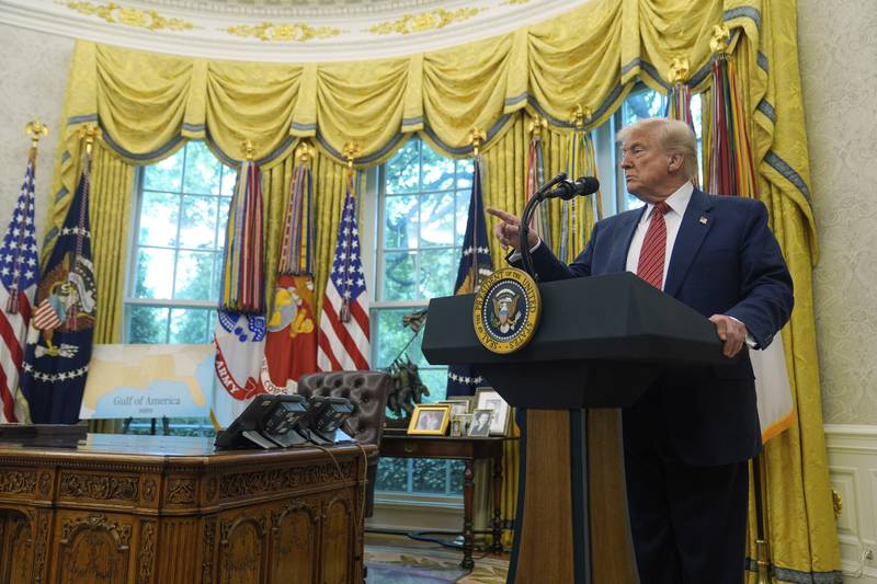 President Donald Trump speaks to reporters after David Perdue was sworn in as U.S. Ambassador to China during a ceremony in the Oval Office of the White House, Wednesday, May 7, 2025, in Washington. (AP Photo/Mark Schiefelbein)