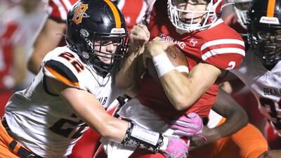 Photos: DeKalb football takes on conference foe Naperville Central