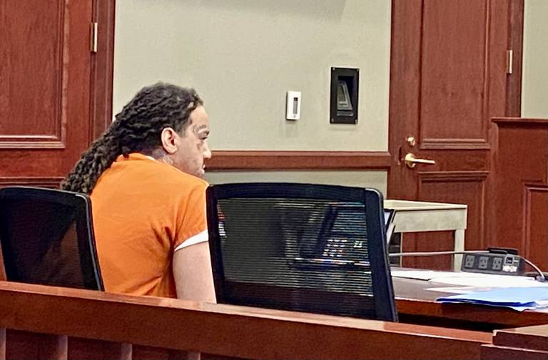 Carreon S. Scott, 22, sits awaiting court proceedings in front of Judge Philip Montgomery on Wednesday, March 12, 2025, at the DeKalb County Courthouse in Sycamore. Scott pleaded guilty to second-degree murder in the May 2023 shooting death of Marlon King Jr., of DeKalb.