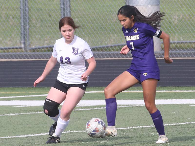 Mendota's Crysal Garcia moves the ball away from Dixon defender Kailey Helfrich on Wednesday, May 1, 2024 at Mendota High School.