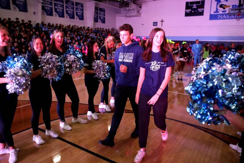 Nazareth Academy seniors Chris Lopez of Westchester and Margaret King of Western Springs are named to the homecoming court during a homecoming pep rally at the La Grange Park school on Friday, Sept. 30, 2022.