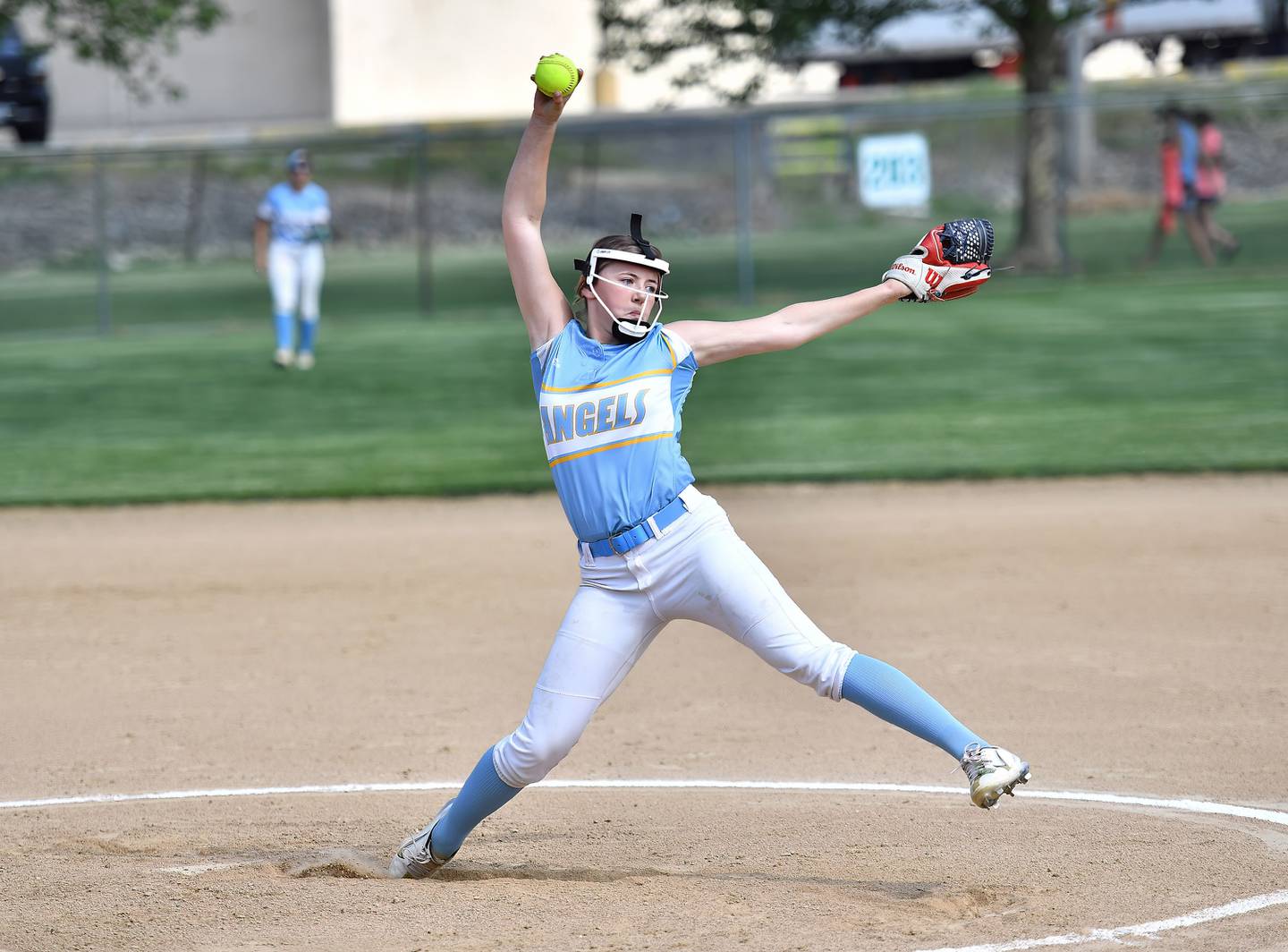 Joliet Catholic's Sydney Walker throws a pitch during the regional semifinal game against Crete Monee on Tuesday, May. 23, 2023, at New Lenox.