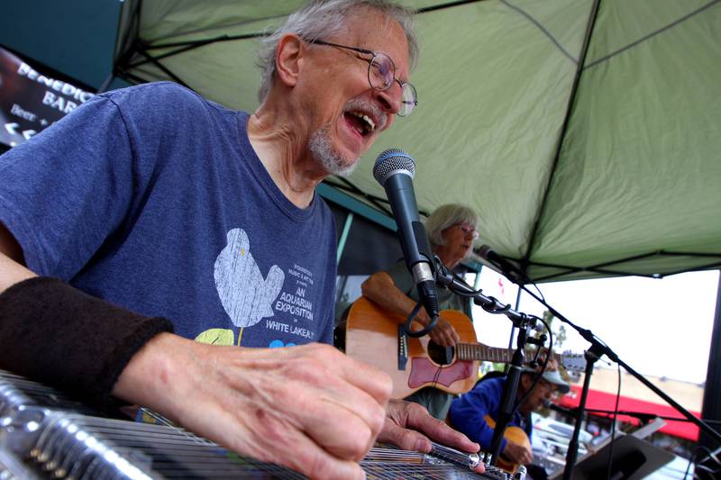 The musical group Northwest Hwy performs classic rock songs during the Johnny Appleseed Festival in downtown Crystal Lake on Saturday Sept. 28, 2024, in Crystal Lake.