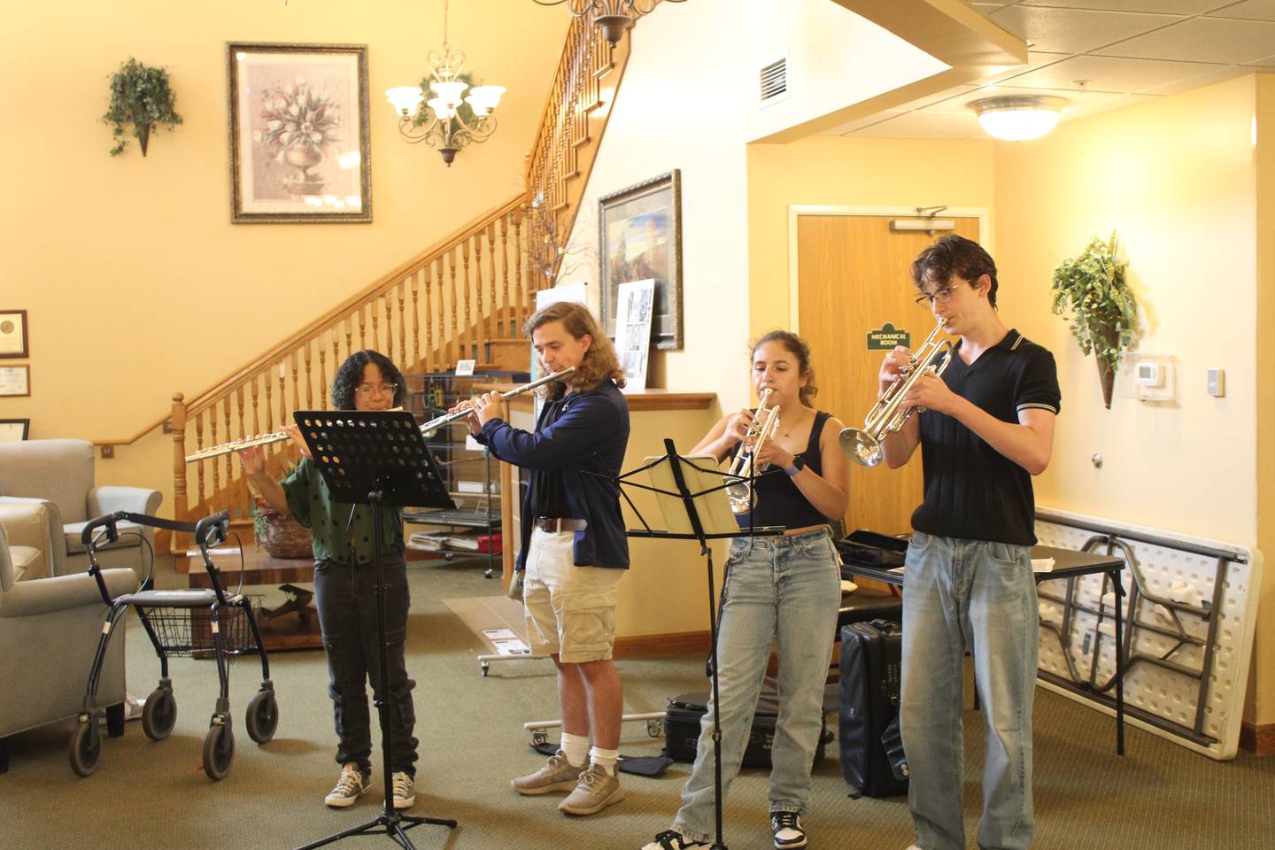 From left to right: McHenry High School students Jiji Thorne, Gavin Wuchter, Yaneli Solorio and Andrew Costello perform patriotic songs during a Flag Day ceremony at Heritage Woods of McHenry.