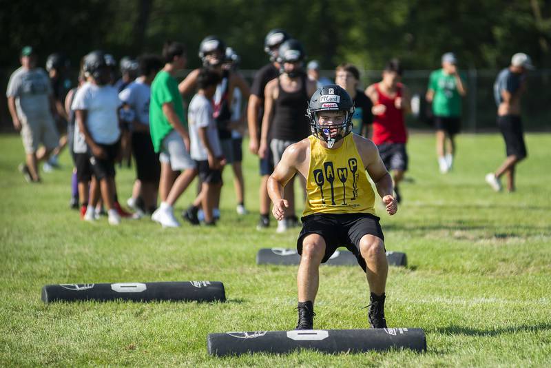 Rock Falls High School football player Ryan McCord works on his footwork Tuesday, July 19, 2022 during camp.