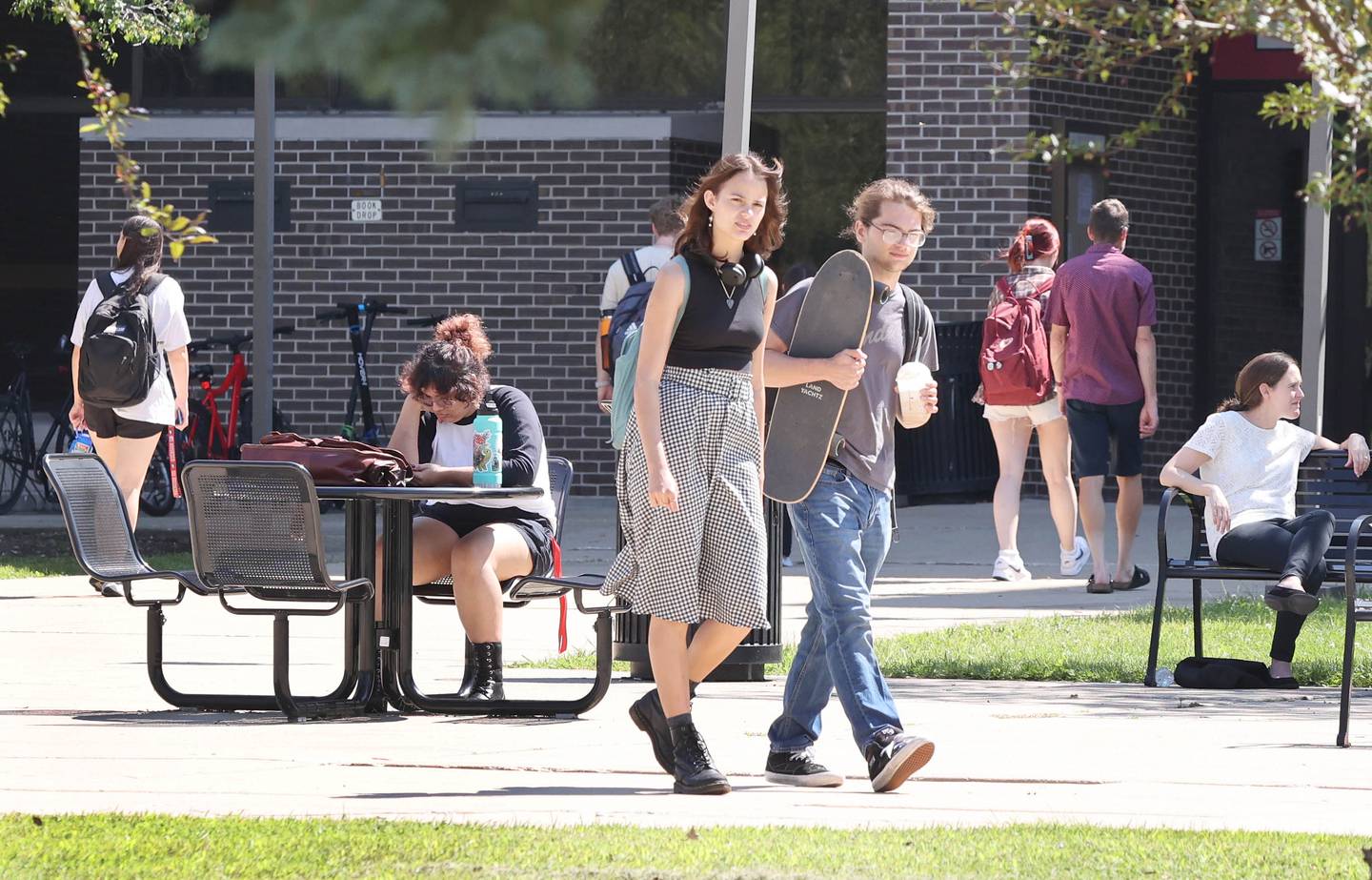Northern Illinois University students move between classes Wednesday, Aug. 24, 2022, on campus at NIU in DeKalb.