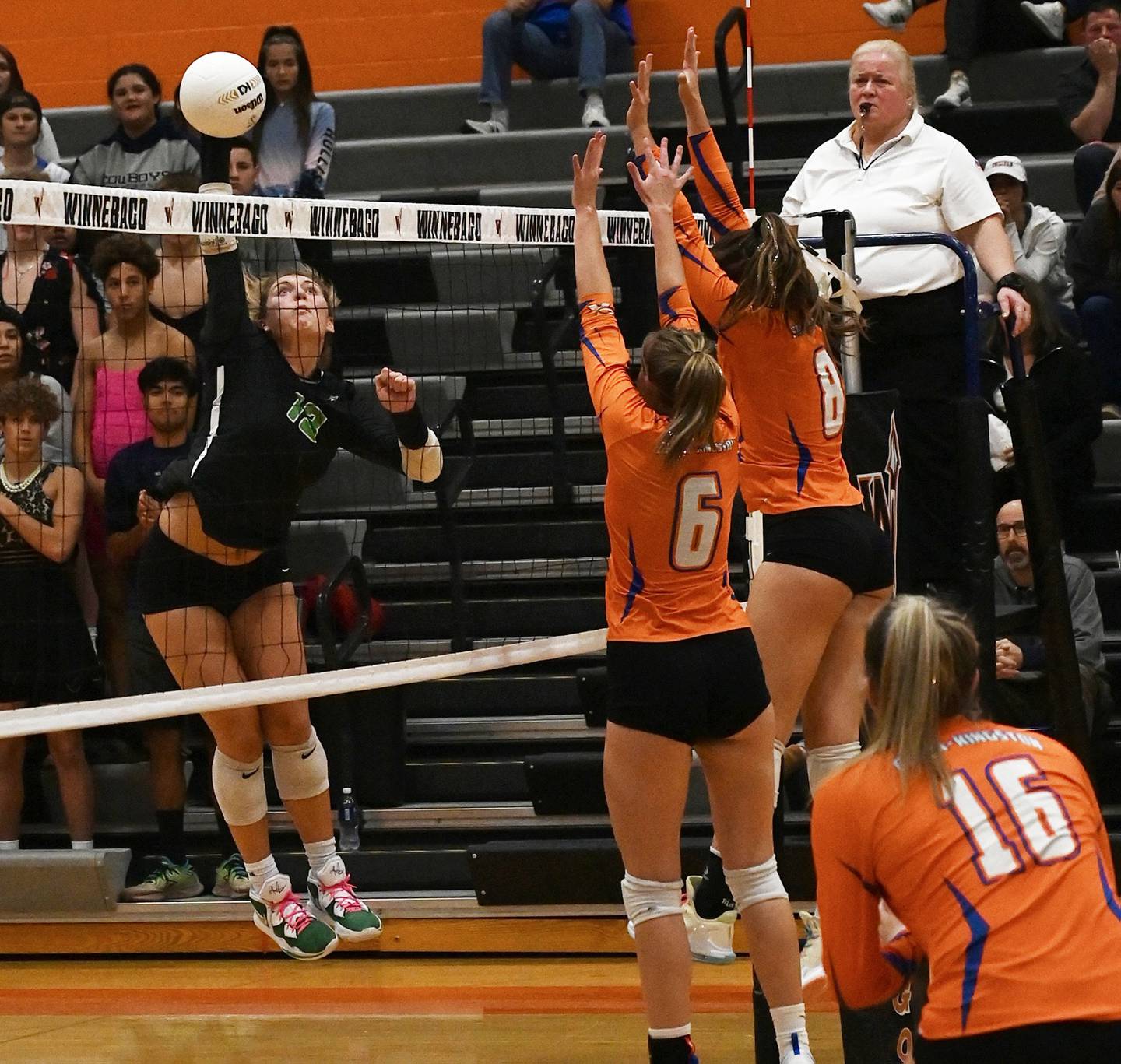 Rock Falls’ Claire Bickett makes a shot against Genoa Kingston’s Kaitlin Rahn and Alivia Keegan during the 2A sectional final on Wednesday, Nov. 2, 2022.