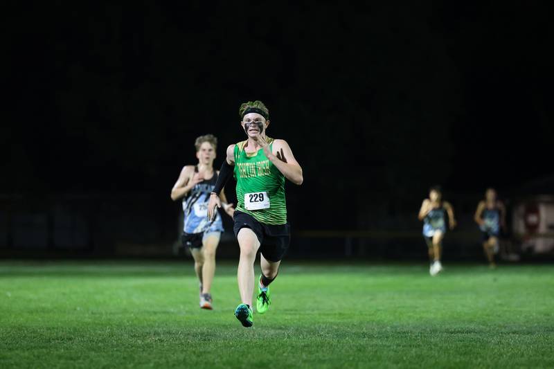 Bishop McNamara's Cooper Austiff nears the finish line during the All-City cross country meet at Bishop McNamara on Wednesday, Sept. 17, 2025.