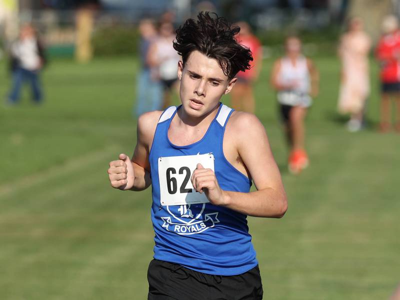 Hinckley-Big Rock’s Caden Hageman comes to the finish line in fourteenth place in the varsity race Tuesday, Sept. 2, 2025, during the Sycamore Cross Country Invitational at Northern Illinois University in DeKalb.