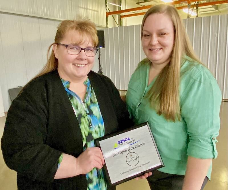 Melissa Freund (left), owner of confectionary Sweet-DeLights, poses with her employee Jennifer Taylor, after their business was awarded the 2024 Spirit of the Chamber on Thursday, Feb. 13, 2025, at the chamber's 68th Annual Meeting and Awards Dinner at Custom Aluminum Products, 312 Eureka St., Genoa.
