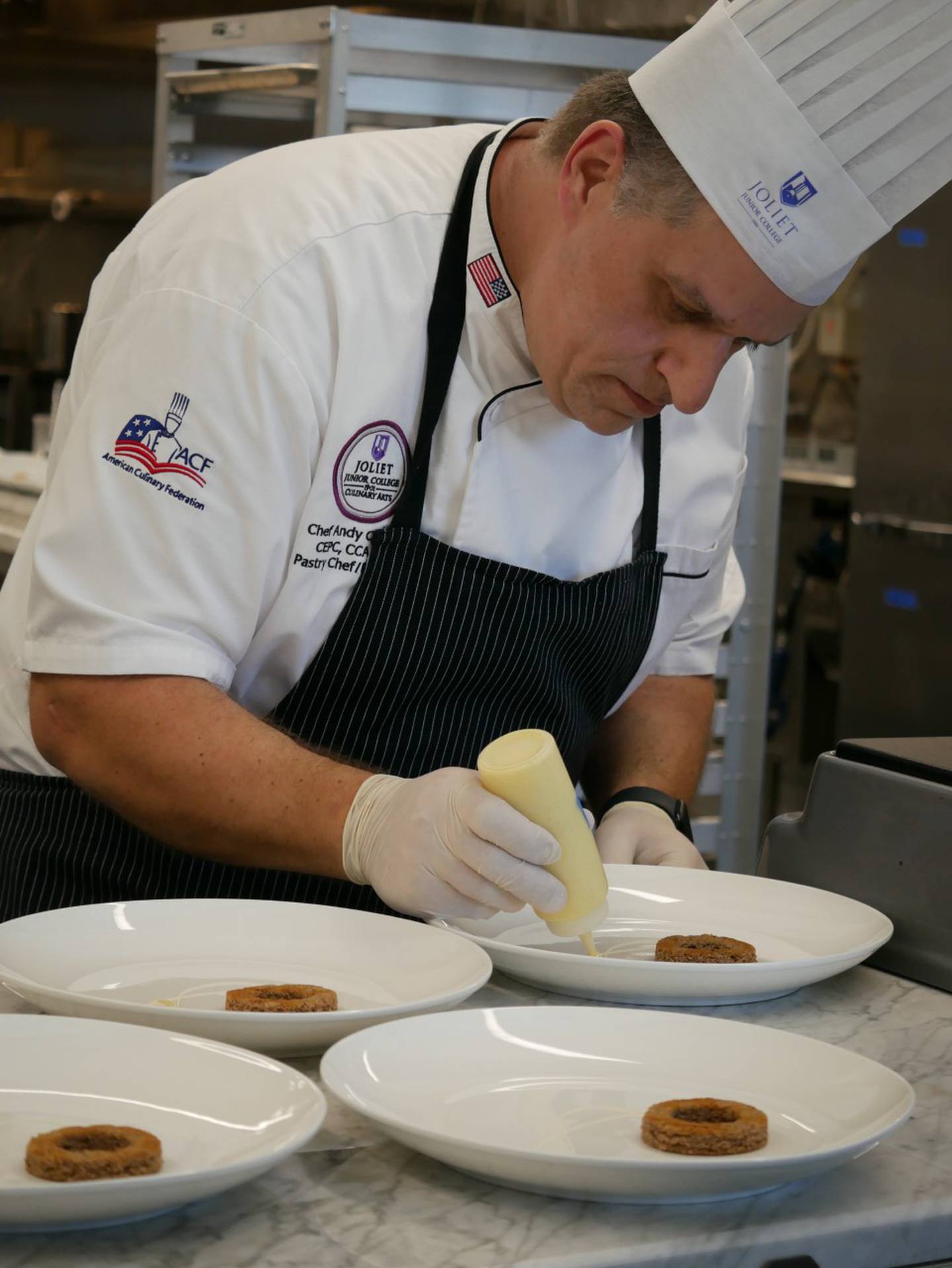 Joliet Junior College pastry chef Andy Chlebana is seen at the Culinary Institute at Virginia Western in January. Chlebana is taking the test for his certified master pastry chef just seven months after having brain surgery to treat his acromegaly, a rare endocrine disorder.