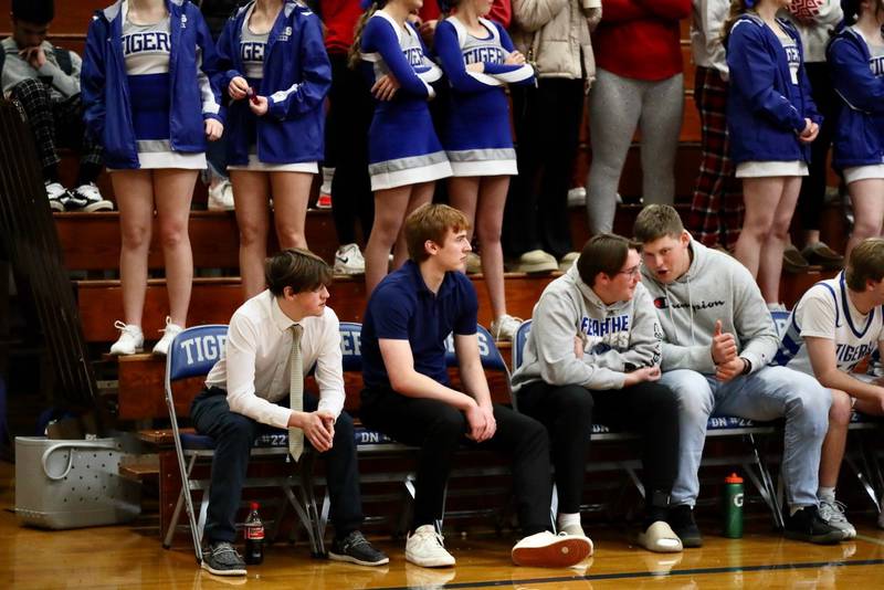 The Tiger bench watches the game Tuesday night, including injured Jimmy Starkey, Jordan Reinhardt and Bennett Williams.