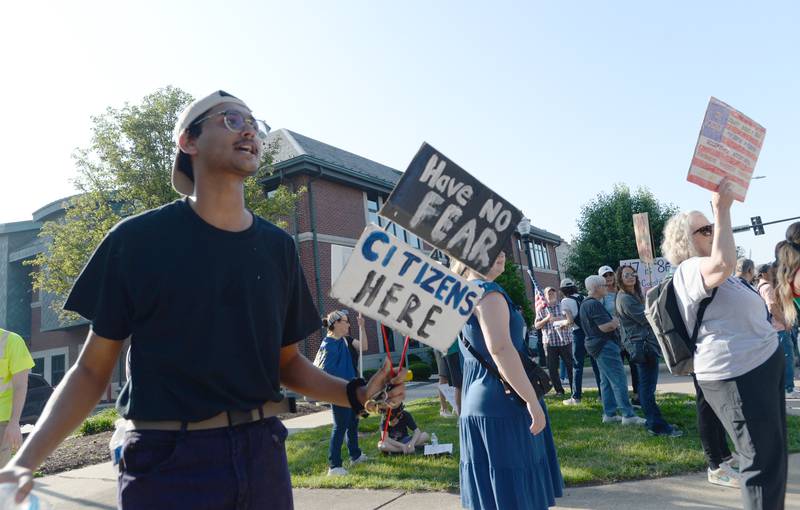 Kavi Mathon of Burbank helps lead participants of the No Kings Day Rally in LaGrange in chanting "Show me Democracy Looks Like, This is What Democracy Looks Like"  Saturday June 14, 2025.