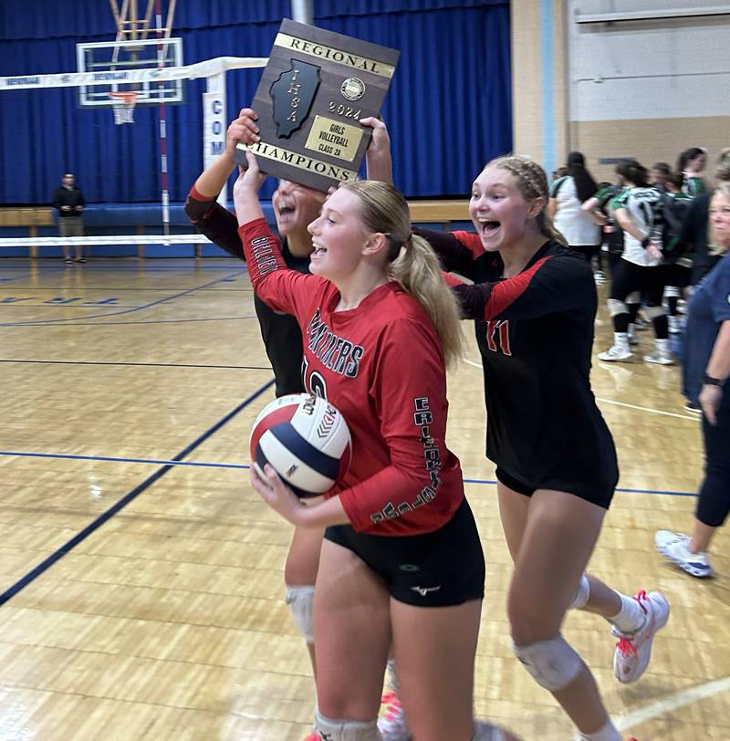 Erie-Prophetstown's Peyton Umstead, Jamie Neumiller, and Lauren Abbott accepted the trophy after the Panthers defeated Rock Falls in two sets to win the 2A Sterling Newman Regional on Thursday, Oct. 31, 2024.