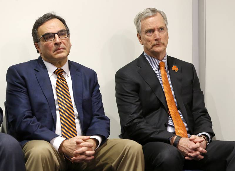 Chicago Bears president Ted Phillips, left and chairman George McCaskey, listen during an end of season press conference on Jan. 4, 2017, in Lake Forest.