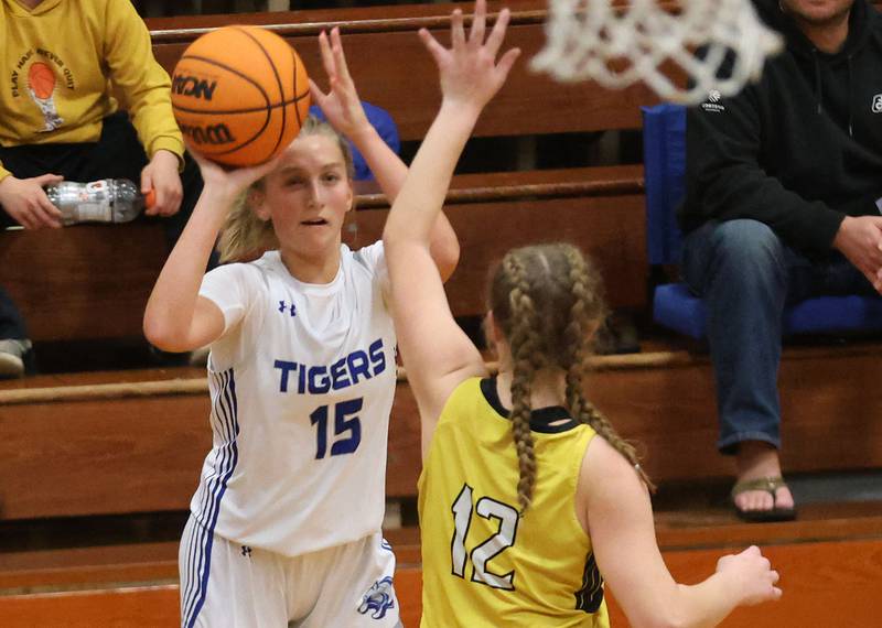 Princeton's Ava Munson, shoots a jump shot over Putnam County's Chloe Parcher during the Tiger Girls Basketball Holiday Tournament on Tuesday, Nov. 18, 2025 at Princeton High School.