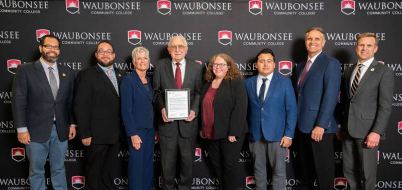 Pictured from left are Waubonsee Board of Trustees Rick Guzman; Jimmie Delgado, vice chair; Rebecca Oliver, chair; James K. Michels, P.E.; Tina Willson; Juan Chiu, student trustee; Greg Thomas; Dr. Brian Knetl, president of Waubonsee Community College.