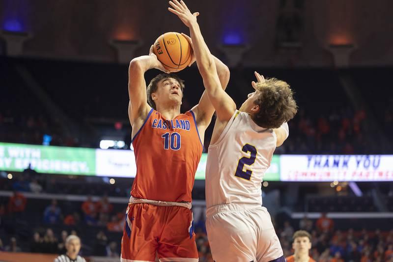 Eastland’s Zyacn Haverland puts a shot up over Peoria Christian’s Gavin Wilder Thursday, March 13, 2025, during the Class 1A boys basketball state semifinal.