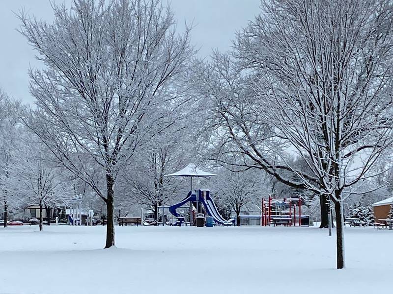 Ladd Park in Crystal Lake was covered in a blanket of snow Saturday, March 25, 2023, after flakes fell overnight and into the morning.